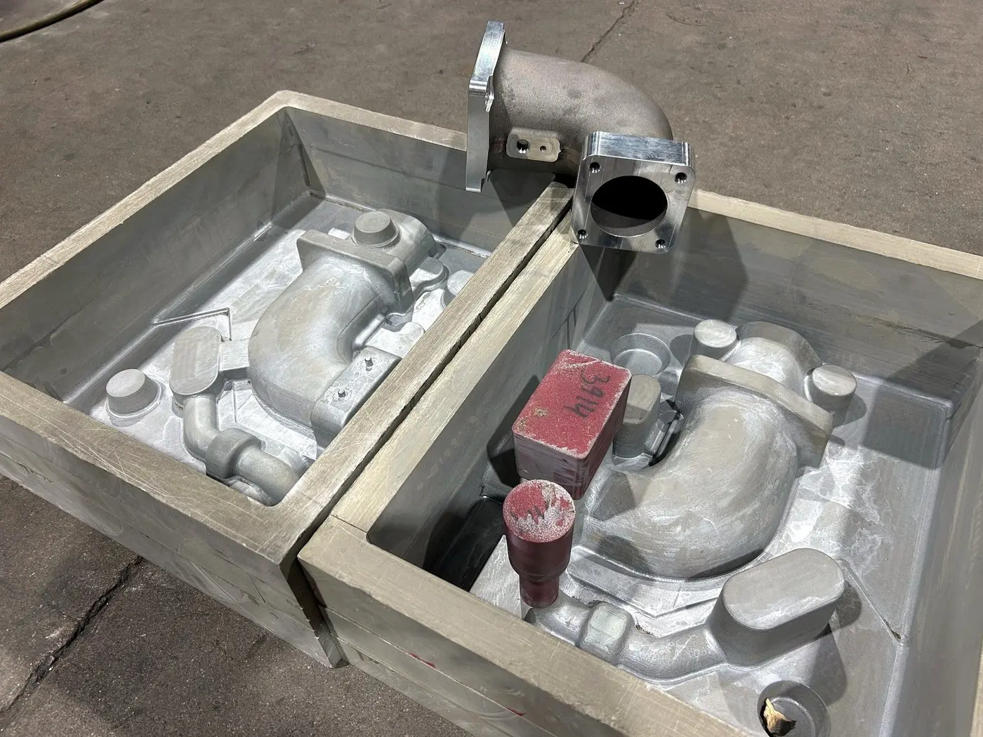 Air set sand pattern with a machined casting