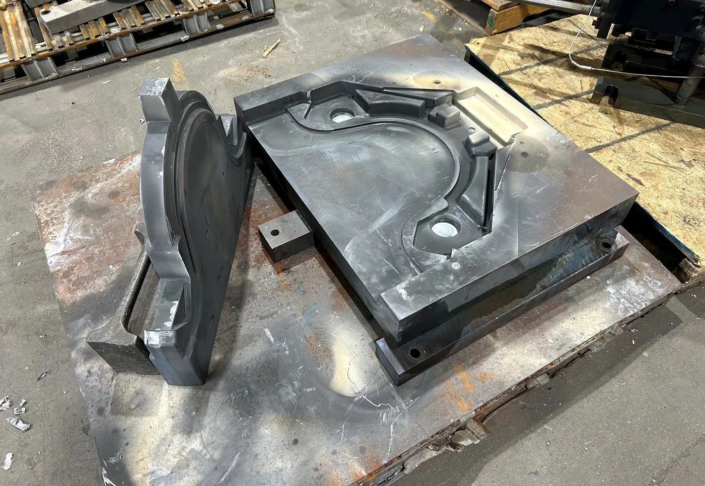 Low pressure permanent mold die with a slide