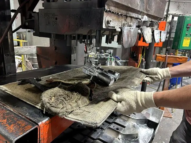 Tilt pour castings being ejected from the die